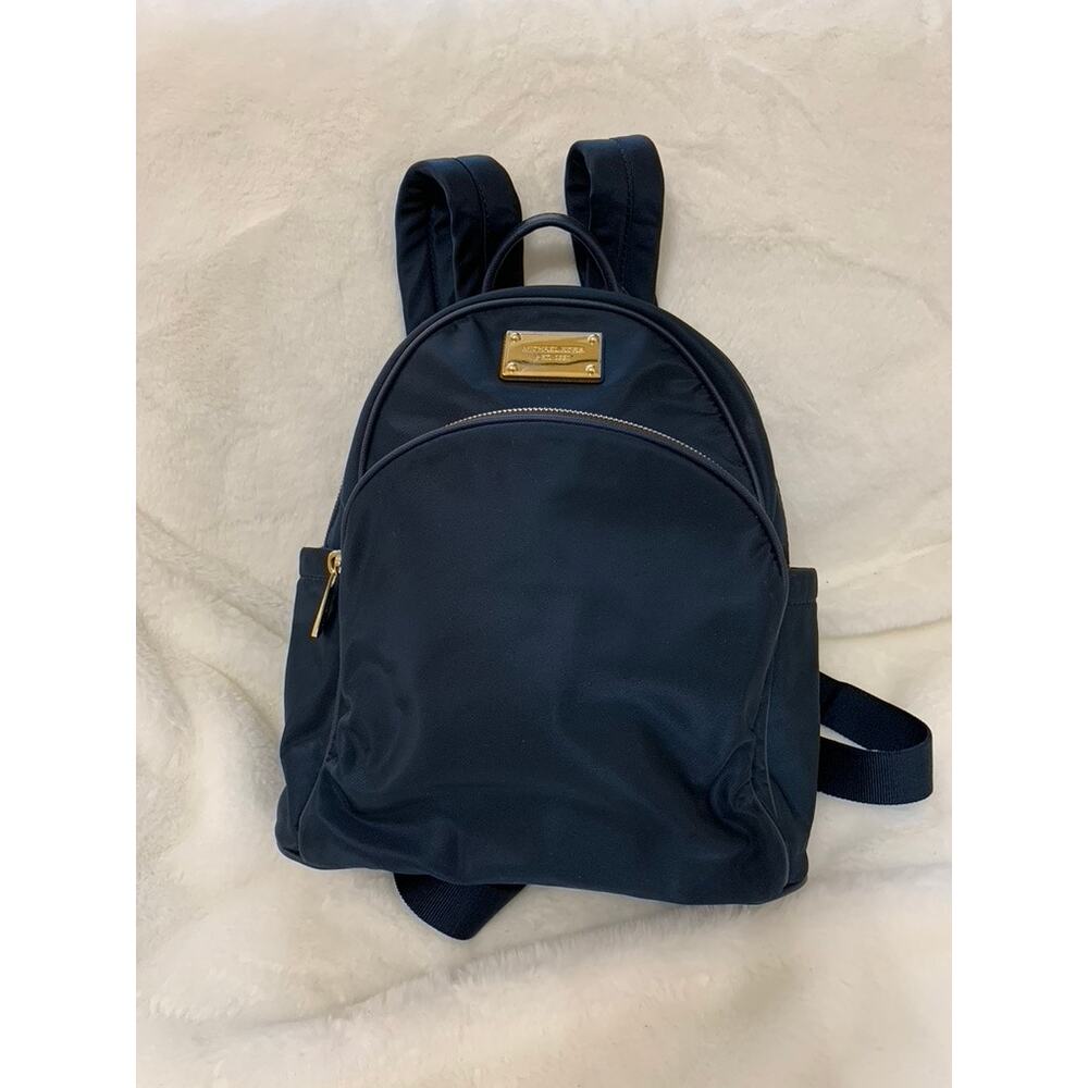Michael Kors Navy Backpack with Gold Hardware and Logo Plaque‎